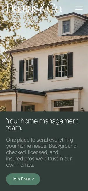 Domas & Co. website on a phone